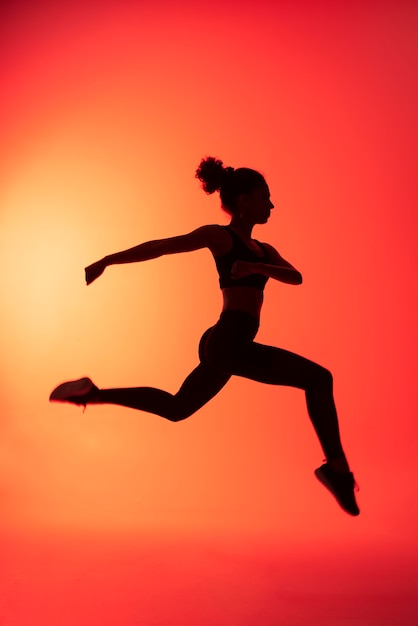 Full shot woman jumping