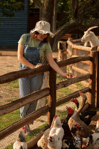 Full shot woman living at farmhouse