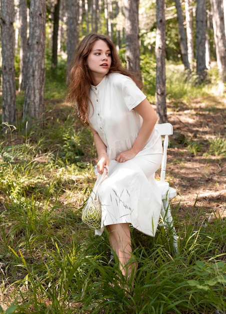 Full shot woman in nature