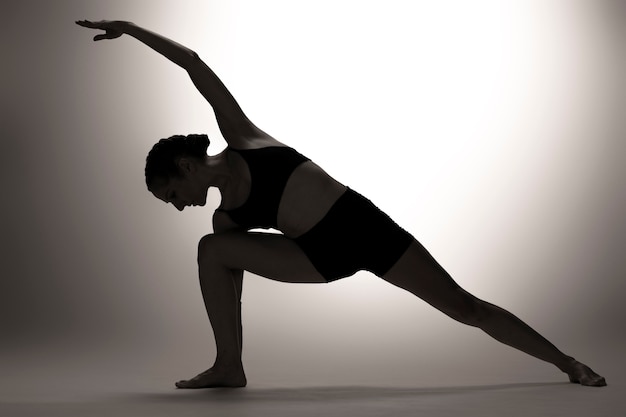 Full shot woman posing in studio