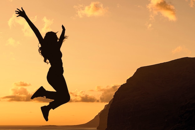 Free Photo full shot woman silhouette jumping