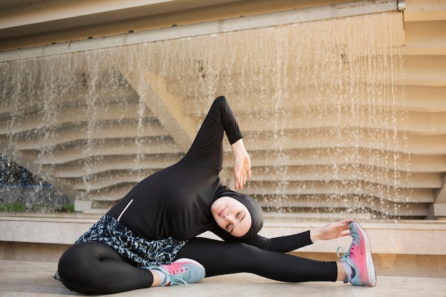 Full shot of woman stretching