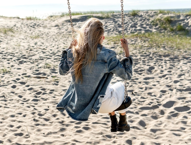 Free photo full shot woman on swing