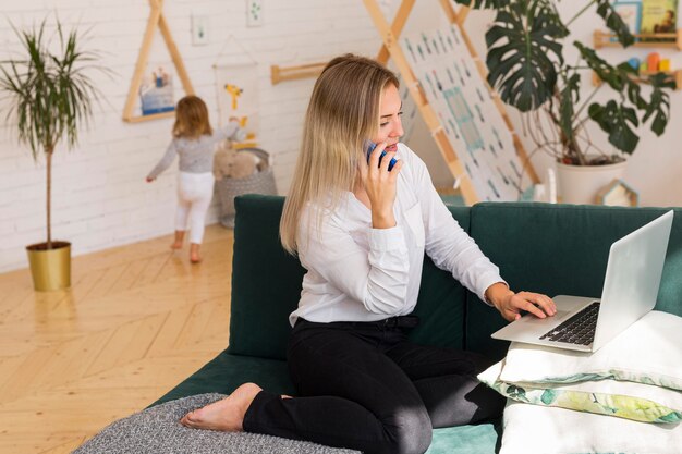 Full shot woman talking on phone