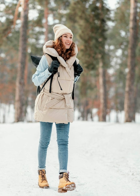 Free Photo full shot woman walking in forest