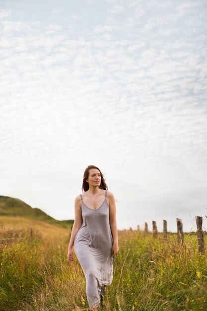 Full shot woman walking in nature