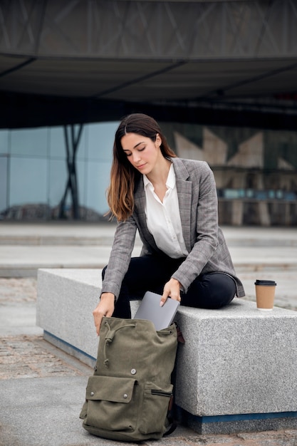 Free Photo full shot woman with backpack