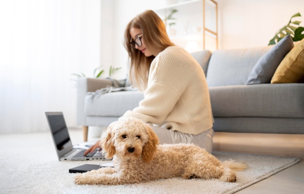 Full shot woman working at home