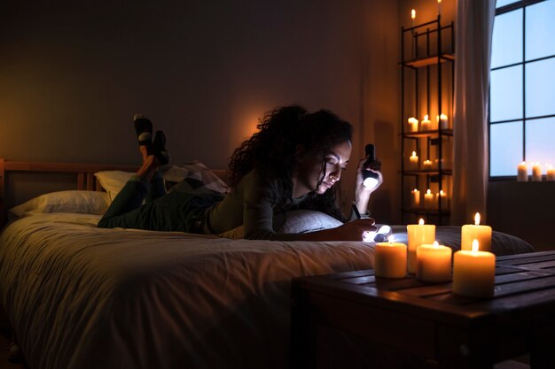 Full shot woman writing in notebook