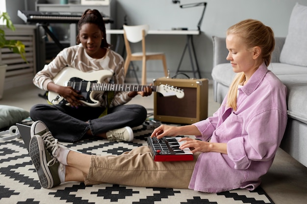 Free Photo full shot women with instruments on floor