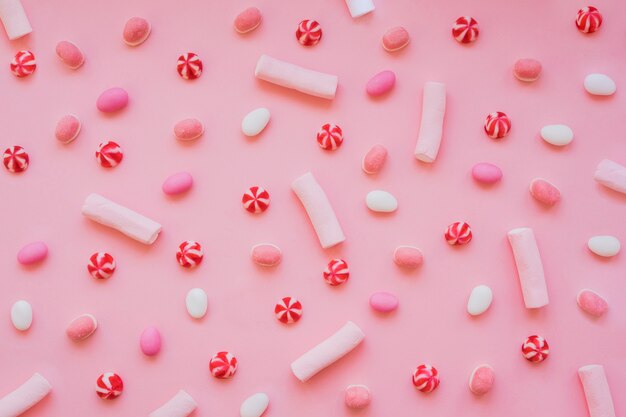 Fun composition with marshmallows, candies and sweets