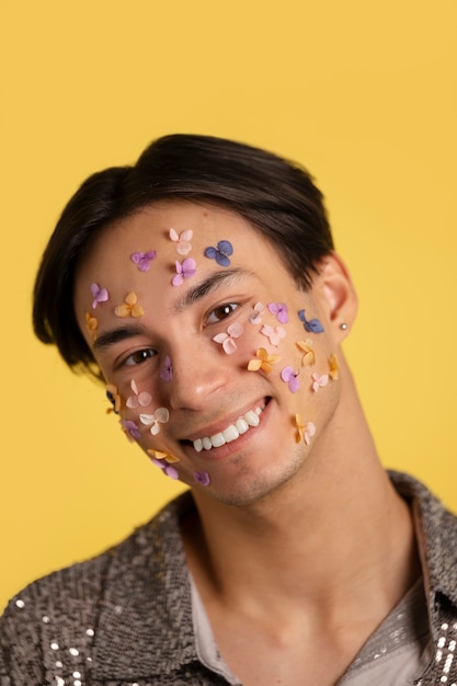 Fun portrait with glued decorations on face