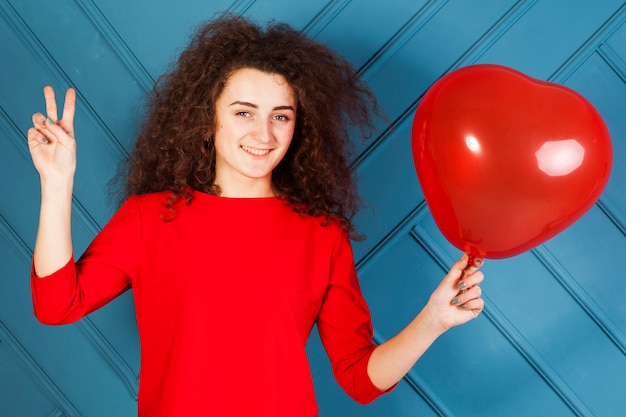 Free Photo funny brunette girl portrait on blue background