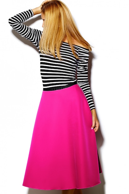 Free photo funny crazy glamor stylish sexy smiling beautiful blond young woman model in pink hipster clothes in studio