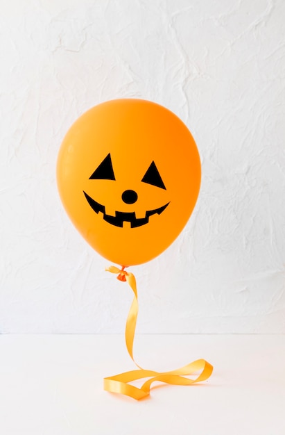 Free photo funny jack-o-lantern balloon for halloween