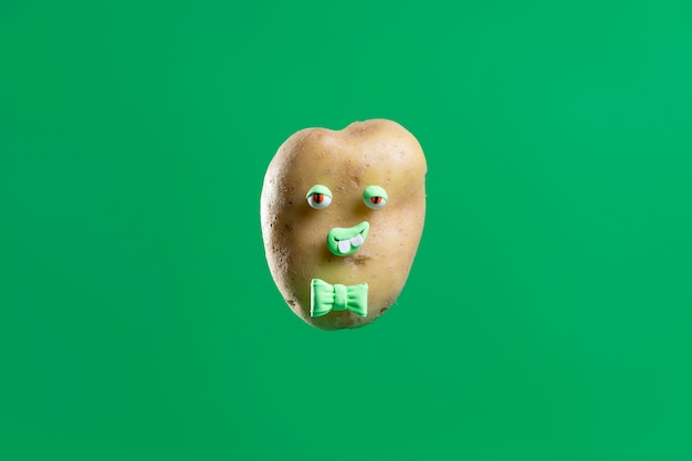 Free photo funny potato with cute sticker