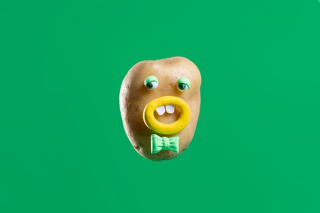 Free photo funny potato with cute sticker