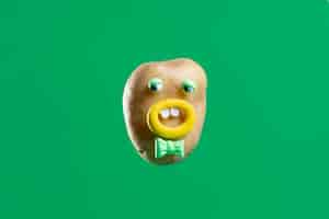 Free photo funny potato with cute sticker