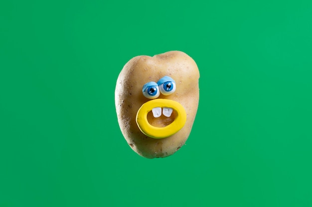 Free photo funny potato with cute sticker