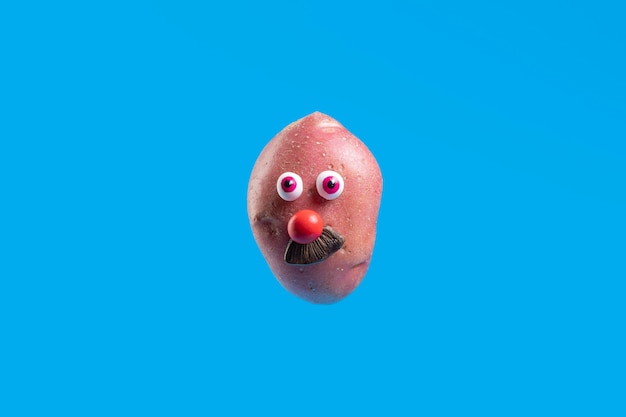 Free photo funny potato with face sticker