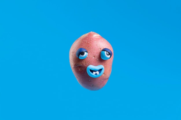 Free photo funny potato with face sticker