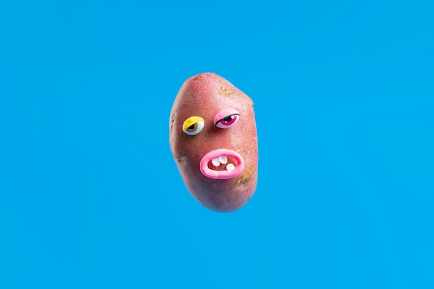 Free photo funny potato with face sticker