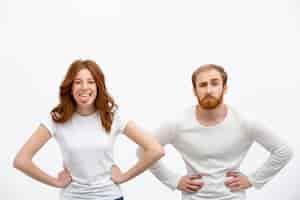 Free photo funny redhead man and woman showing grimaces