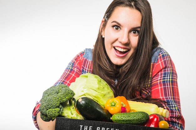 Funny woman with vegetables