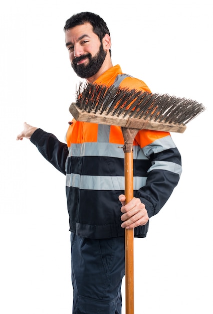 Free photo garbage man pointing back