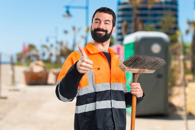 Garbage man with thumb up