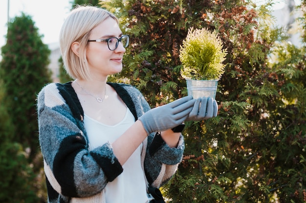 Free Photo gardener with plant