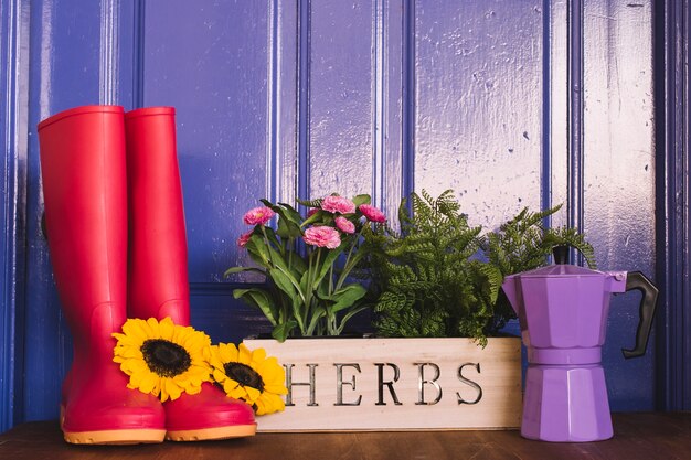 Gardening composition with gumboots and coffeepot