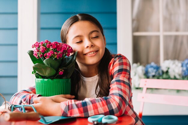 Gardening concept with girl and plant