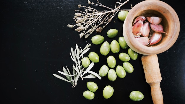 Garlic with olives and herbs