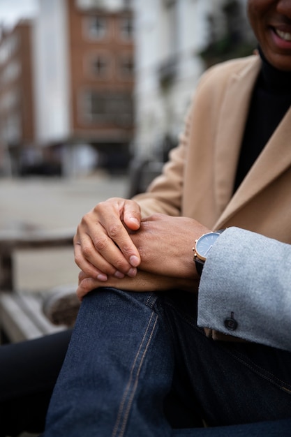 Free Photo gay couple holding hands while on a date in the city