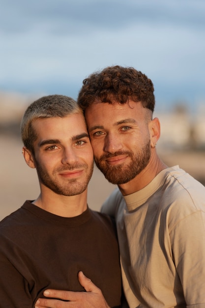 Gay couple spending time together on the beach