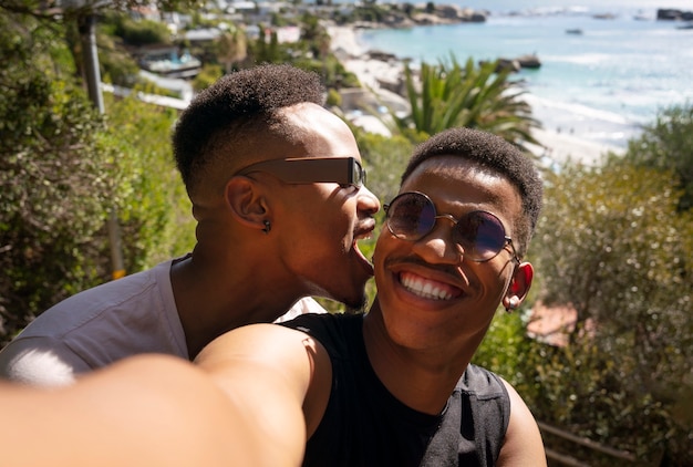 Gay male couple on the beach