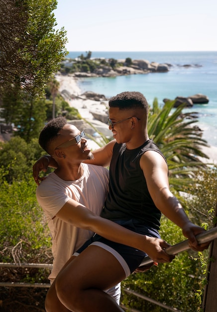 Gay male couple on the beach