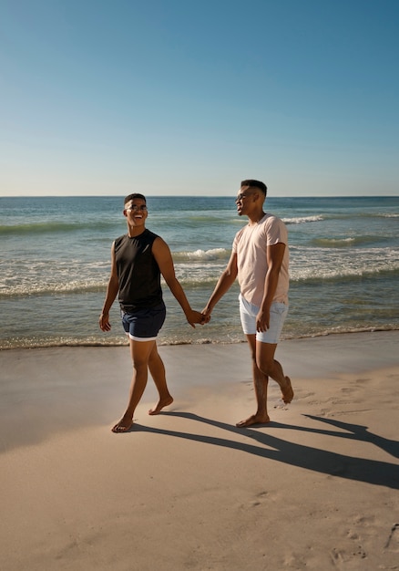 Gay male couple on the beach