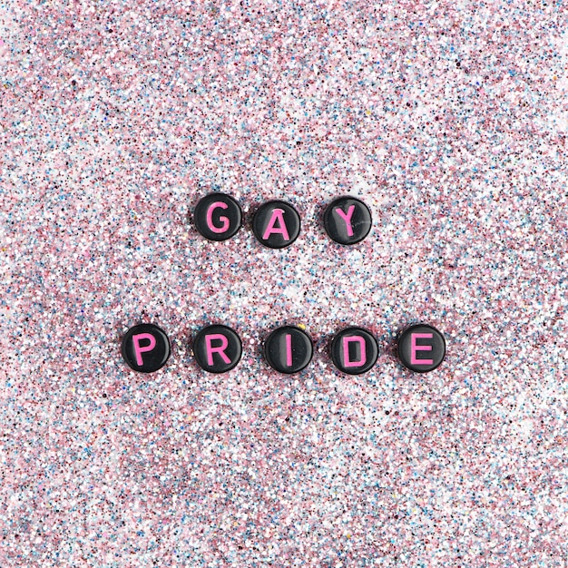 Free photo gay pride word beads lettering