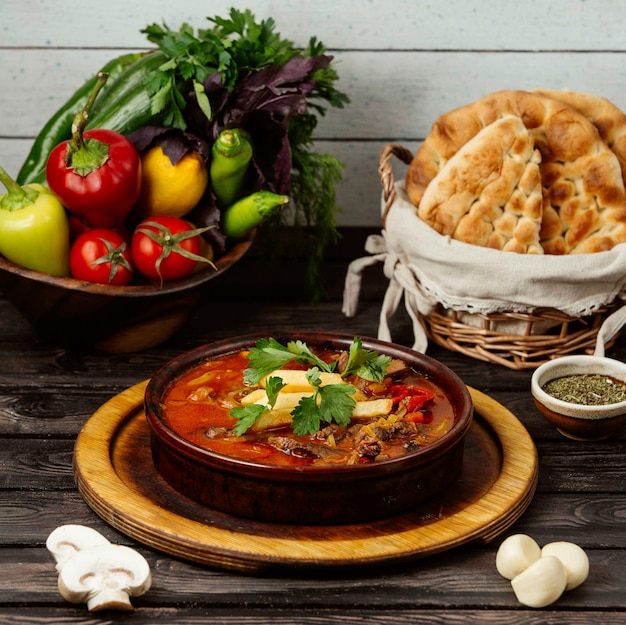 Georgian soup on wooden board