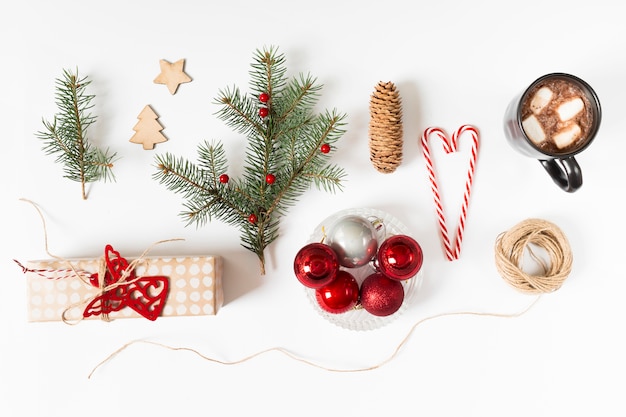 Gift box with fir tree branch and coffee cup 