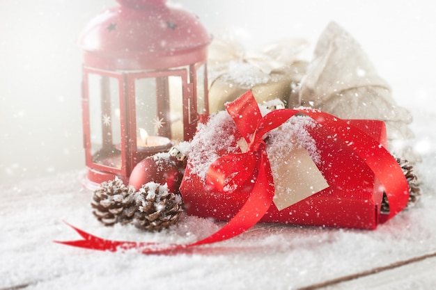 Free photo gift with a red tie and an antique lamp