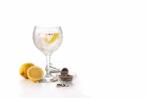 Free photo gin tonic cocktail drink into a glass isolated on white background copy space