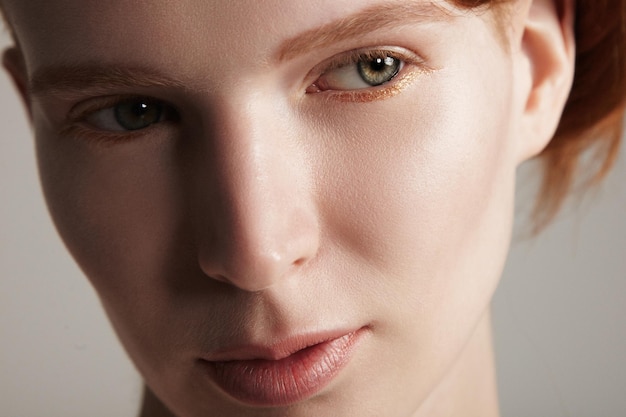 Ginger hair model portrait with ideal beauty skin closeup portrait