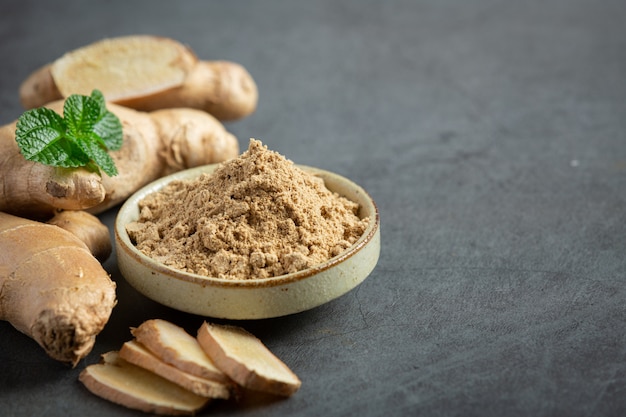 Free photo ginger root and ginger powder on table