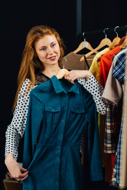 Ginger woman with blue dress