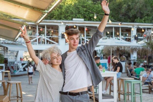 Girl and boy celebrating the end of quarantine