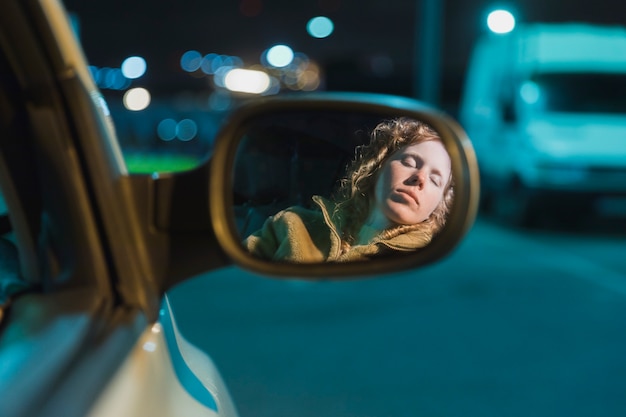 Free photo girl in car at night