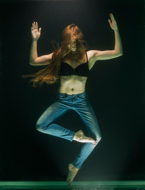 Girl dancing under the water